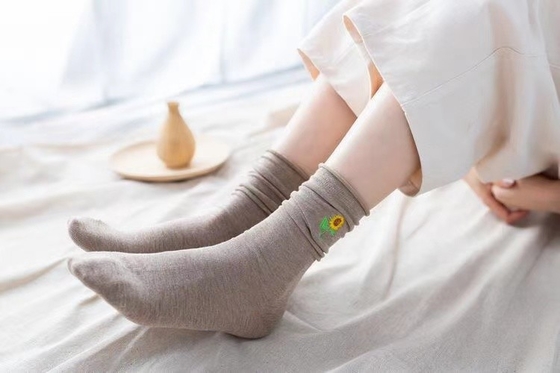 Wholesale Autumn And Winter New Solid Color Sunflower Embroidery Pile Socks In Tube Socks Casual All-Match