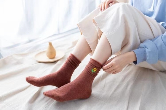 Wholesale Autumn And Winter New Solid Color Sunflower Embroidery Pile Socks In Tube Socks Casual All-Match