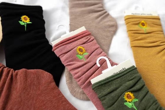 Wholesale Autumn And Winter New Solid Color Sunflower Embroidery Pile Socks In Tube Socks Casual All-Match