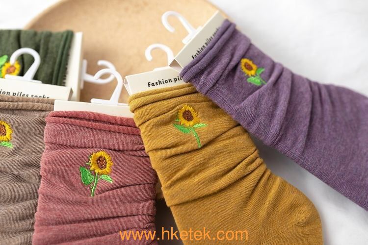 Wholesale Autumn And Winter New Solid Color Sunflower Embroidery Pile Socks In Tube Socks Casual All-Match